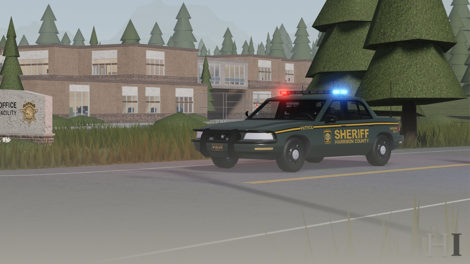A Harrison County Sheriff's Office patrol car with its emergency lights active, parked on the road outside the Sheriff's Office facility.