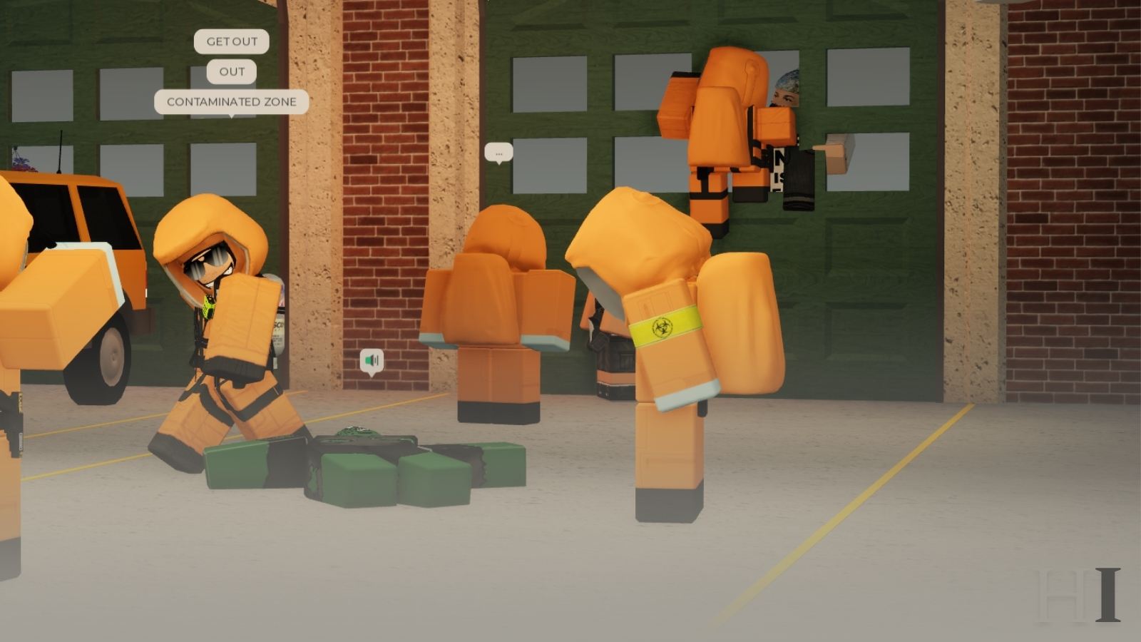 People in orange hazmat-style suits gather around a person lying on the floor of a station garage, with chat bubbles reading &ldquo;Contaminated zone,&rdquo; &ldquo;Out&rdquo; and &ldquo;Get out.&rdquo;